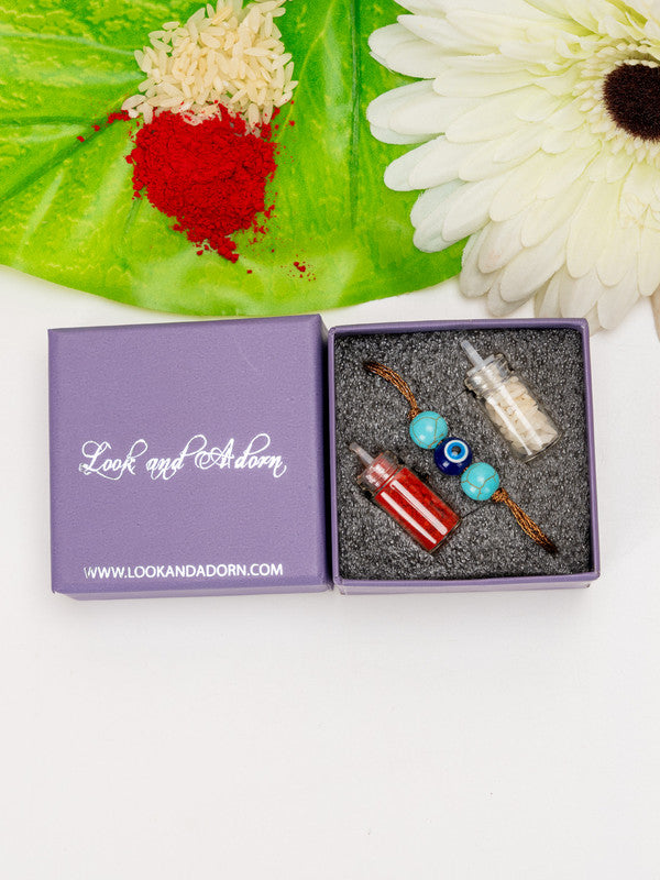 LOOK AND ADORN evil eye rakhi in purple gift box with decorative beads and traditional items