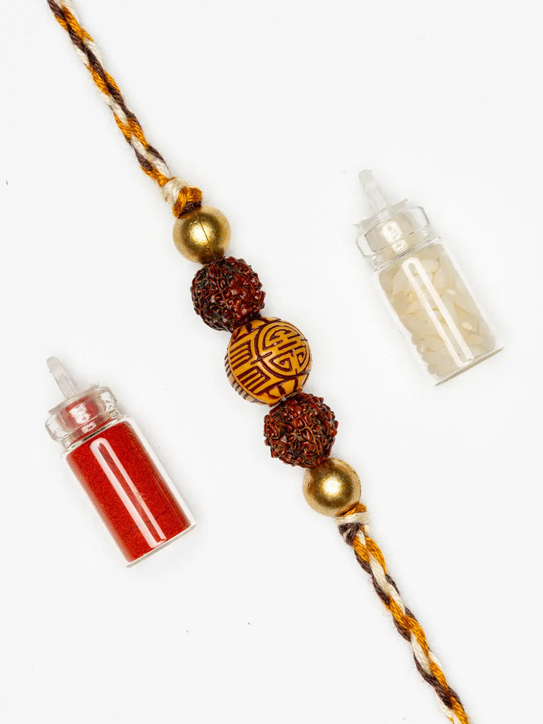 LOOK AND ADORN rudraksh rakhi with decorative beads and twin small containers of red and white powders