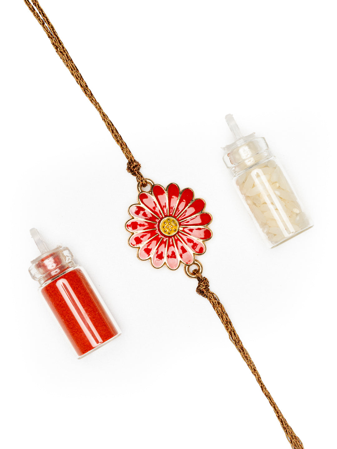 LOOK AND ADORN floral rakhi featuring a red flower design with decorative thread and vibrant color powders