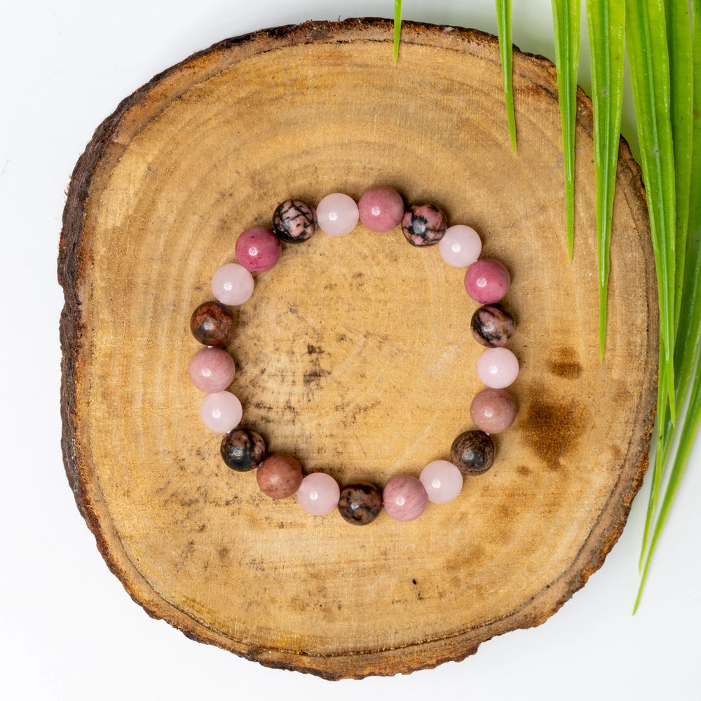Astro-Gemstone love bracelet made with pink and brown gemstone beads for a unique, stylish look