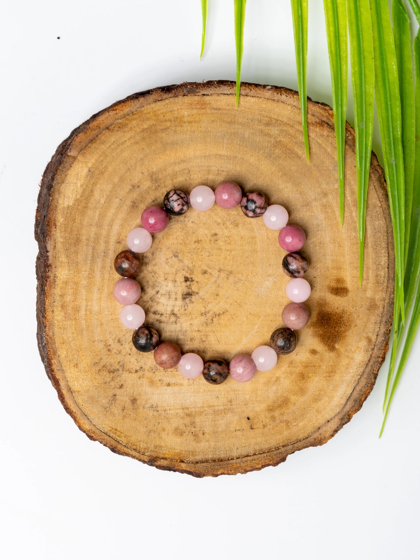 Astro-Gemstone love bracelet made with pink and brown gemstone beads for a unique, stylish look