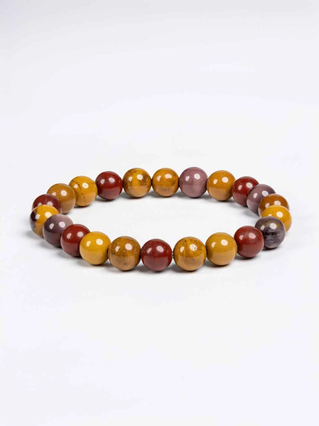 Mookaite Jasper Bracelet featuring polished beads in earthy tones of red, yellow, and purple for a bohemian style