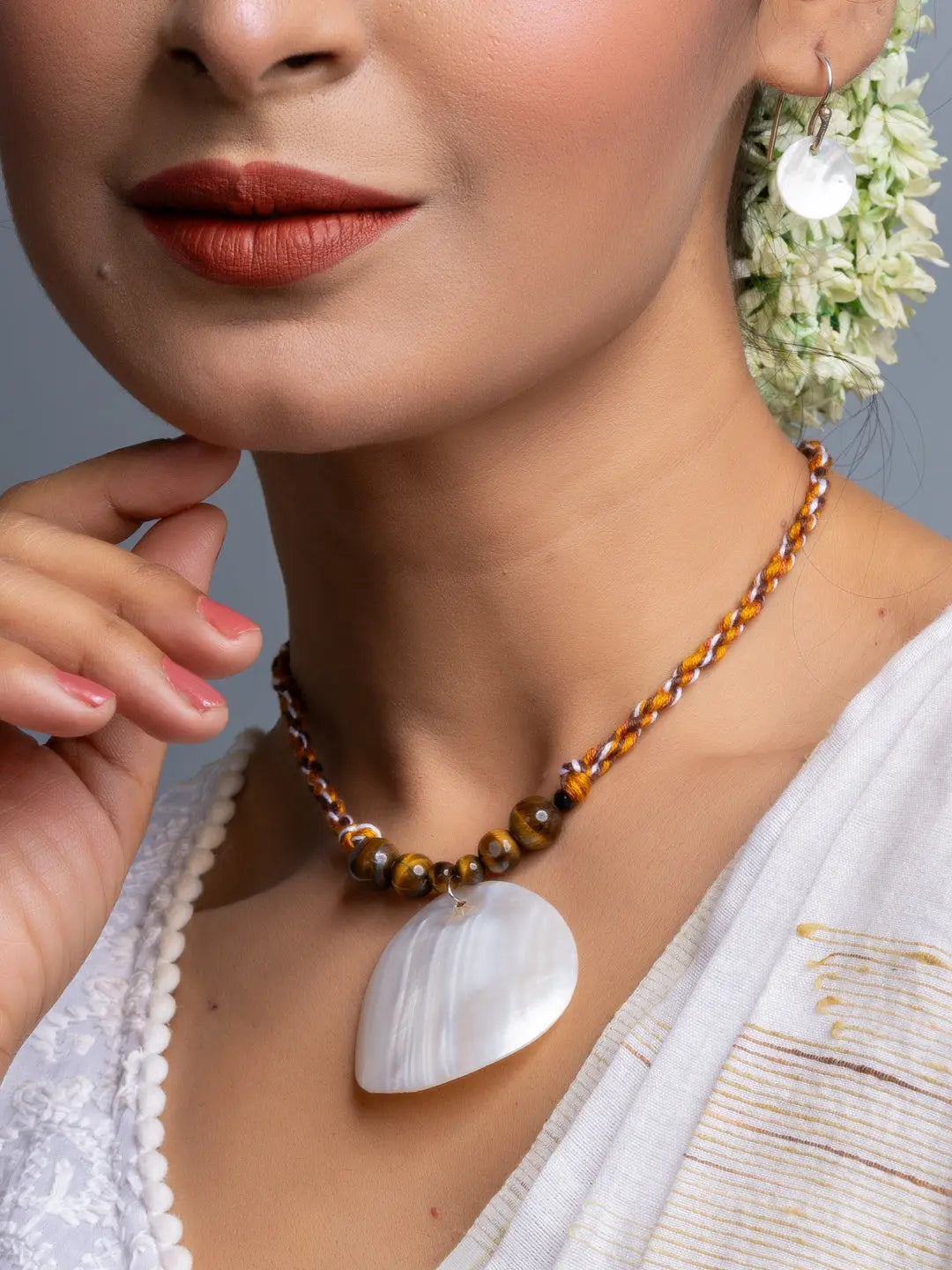 Handmade mother of pearl necklace set with polished beads and unique shell pendant by LOOK AND ADORN