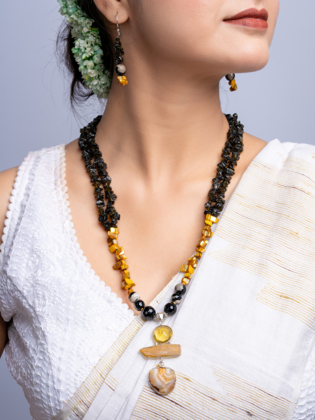 Handmade Mother of Pearl Necklace Set featuring black and yellow beads with matching earrings by LOOK AND ADORN