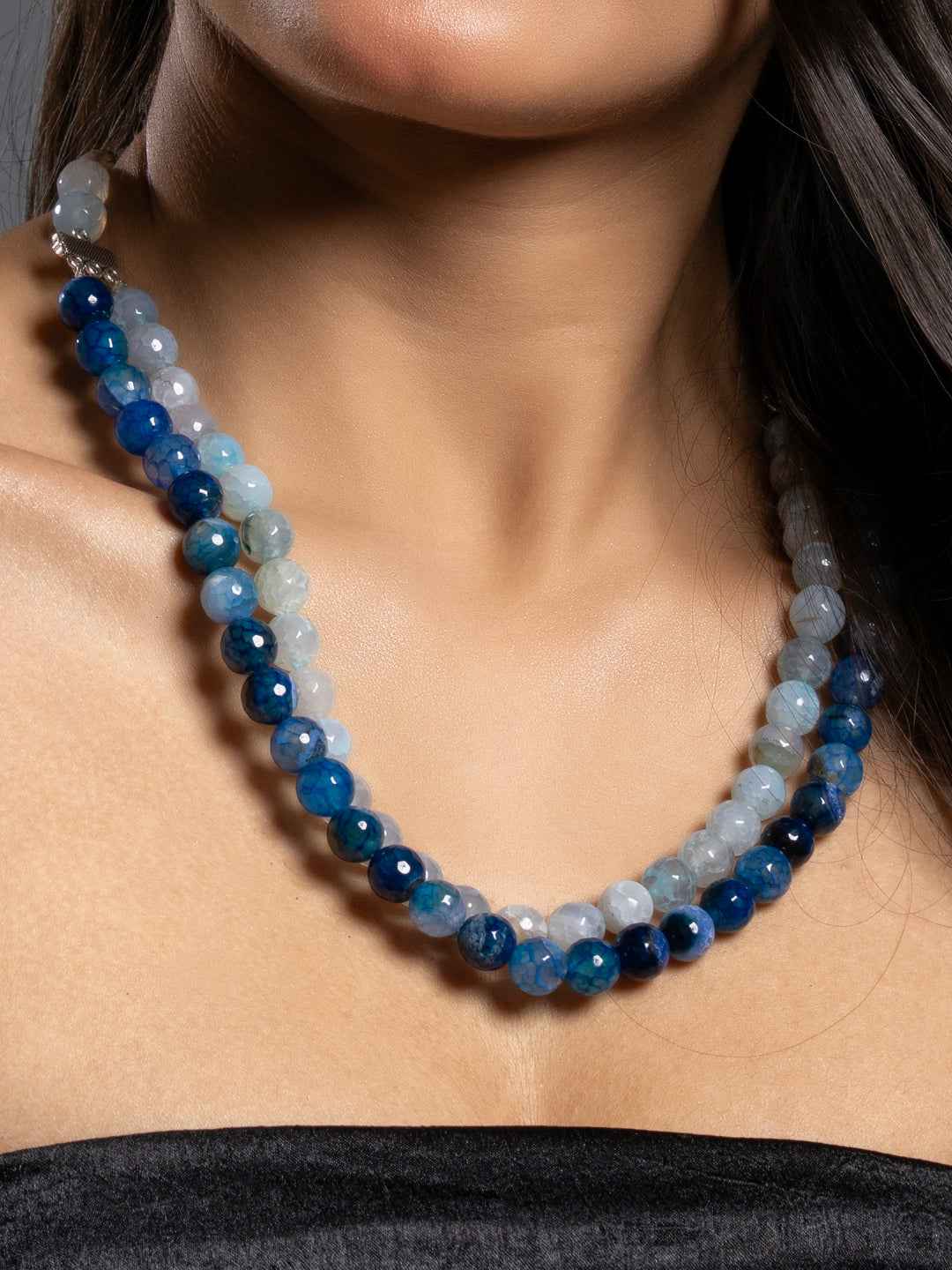 Handmade onyx necklace set with vibrant blue and gray tones featuring smooth polished beads