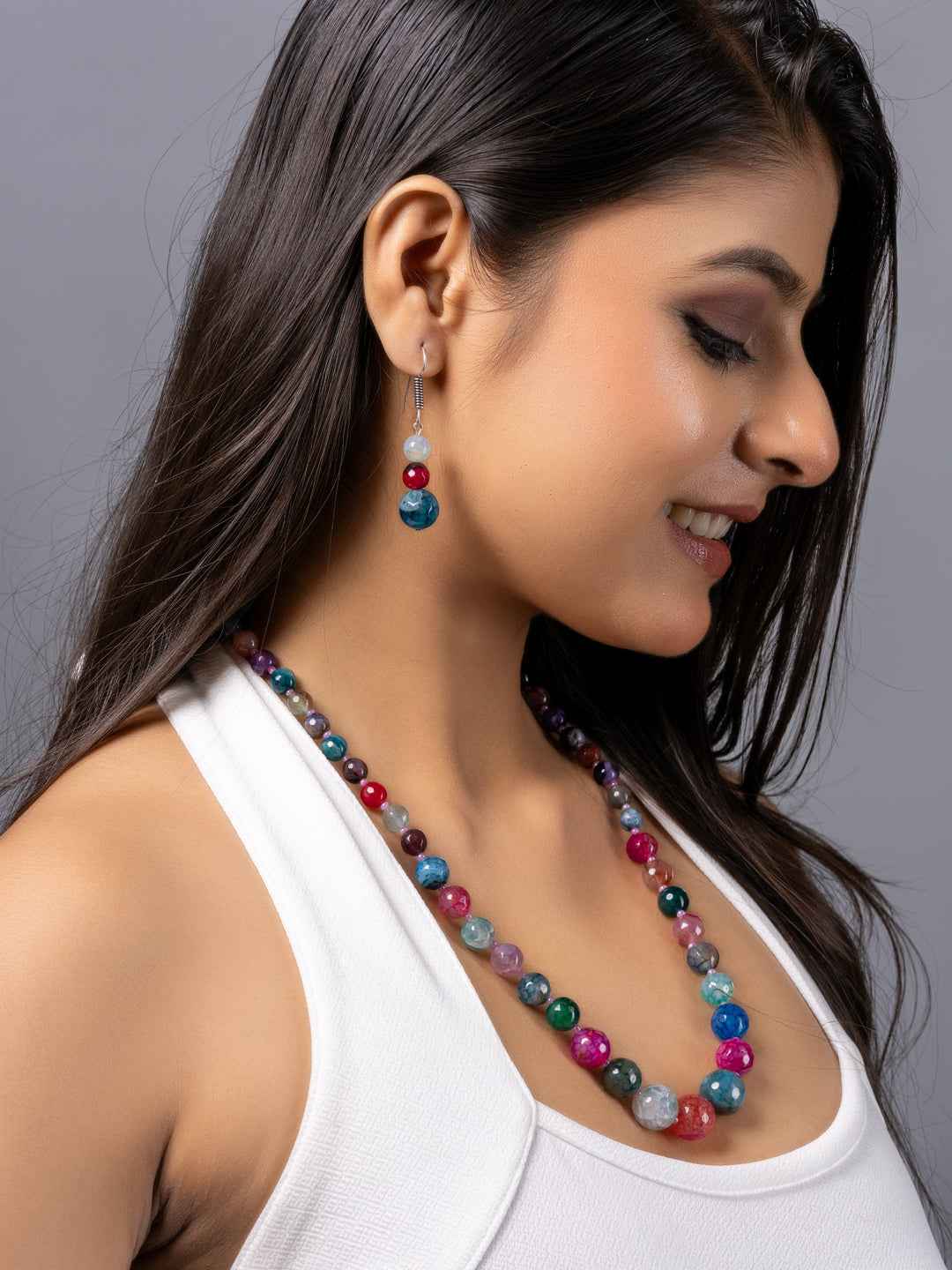 Handmade onyx necklace set featuring vibrant colored beads and matching earrings for a stylish look