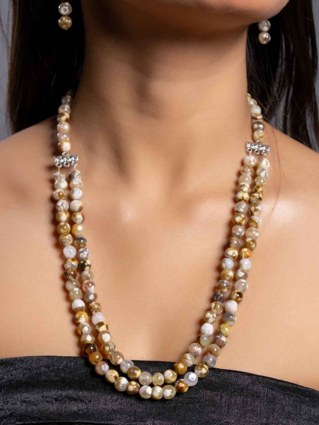 Handmade three-layer onyx necklace set with shimmering beads and elegant silver accents