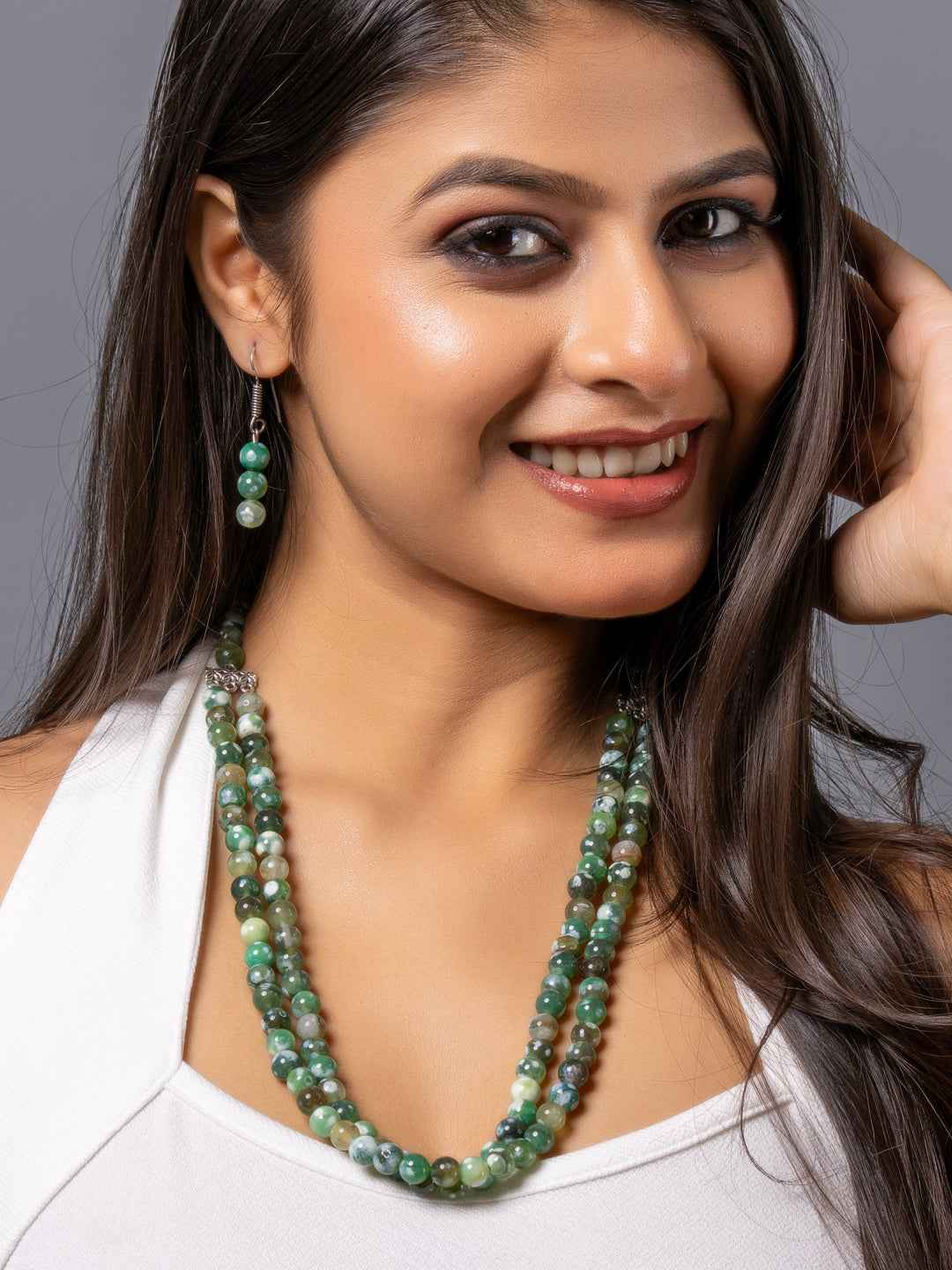 Elegant handmade onyx necklace set featuring green and black stones with matching earrings