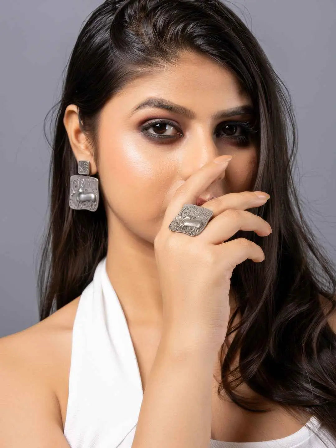 Oxidised earrings with unique geometric design, paired with a matching oxidised ring for a stylish look