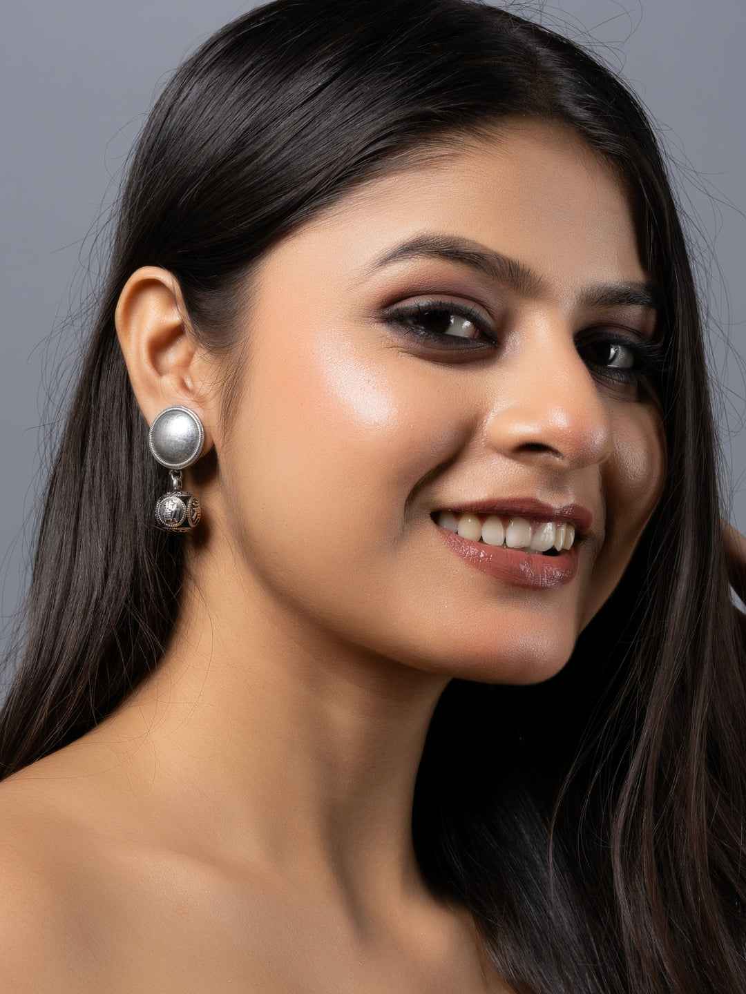 Oxidised earrings featuring a silver-toned design with round and oval shapes for a modern look