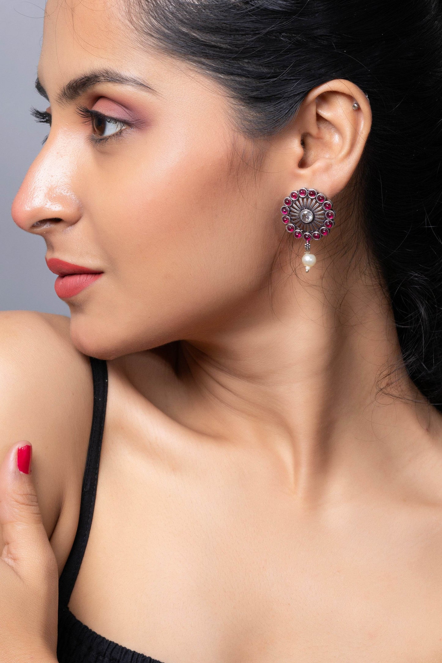 Stylish oxidised silver stud earring with intricate design and colorful embellishments
