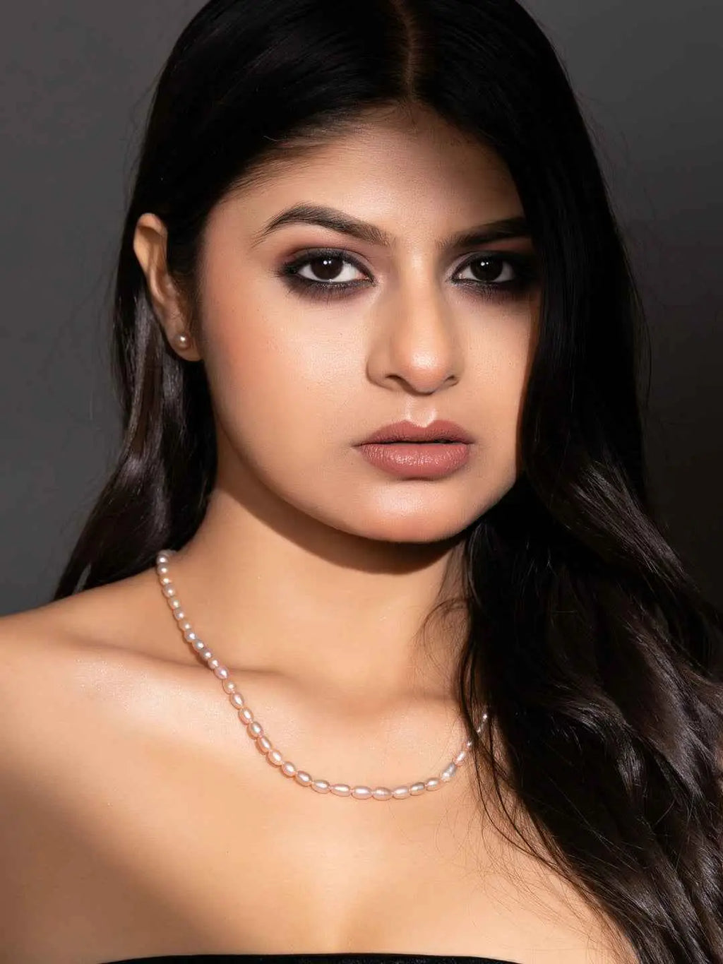 Elegant handmade pearl necklace set in soft white, perfect for formal or casual occasions