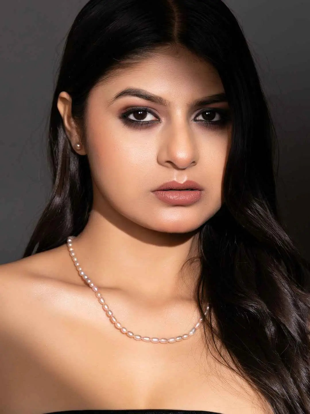 Elegant handmade pearl necklace set in soft white, perfect for formal or casual occasions