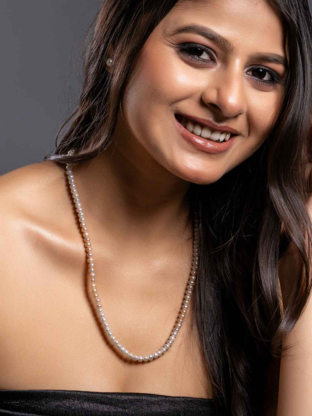Elegant pearl necklace set featuring classic white pearls for a timeless look