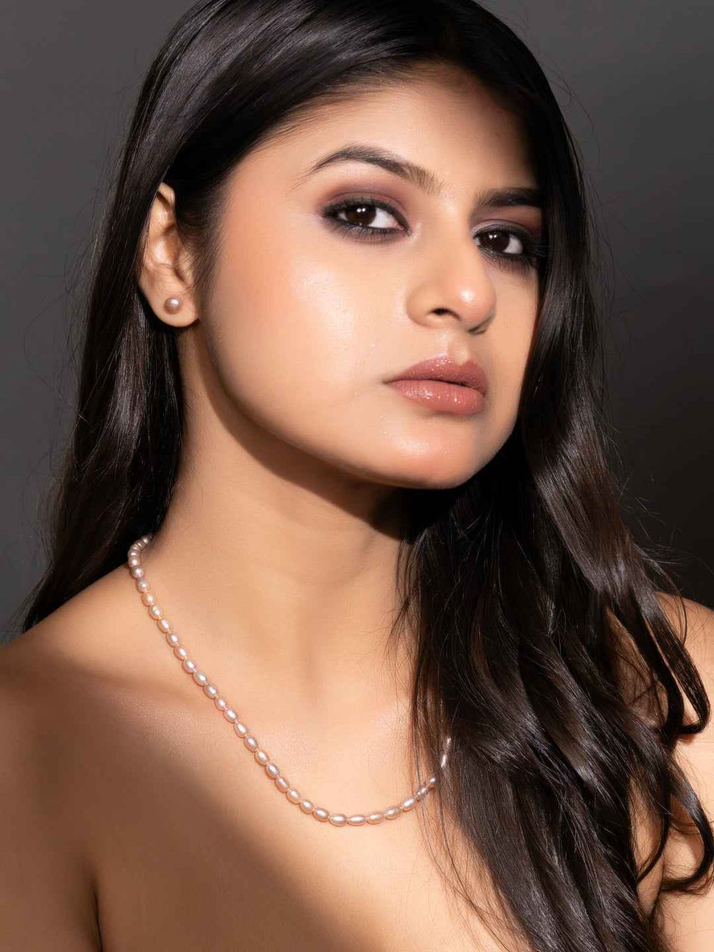 Elegant handmade pearl necklace set in soft white, designed for a classic and timeless look