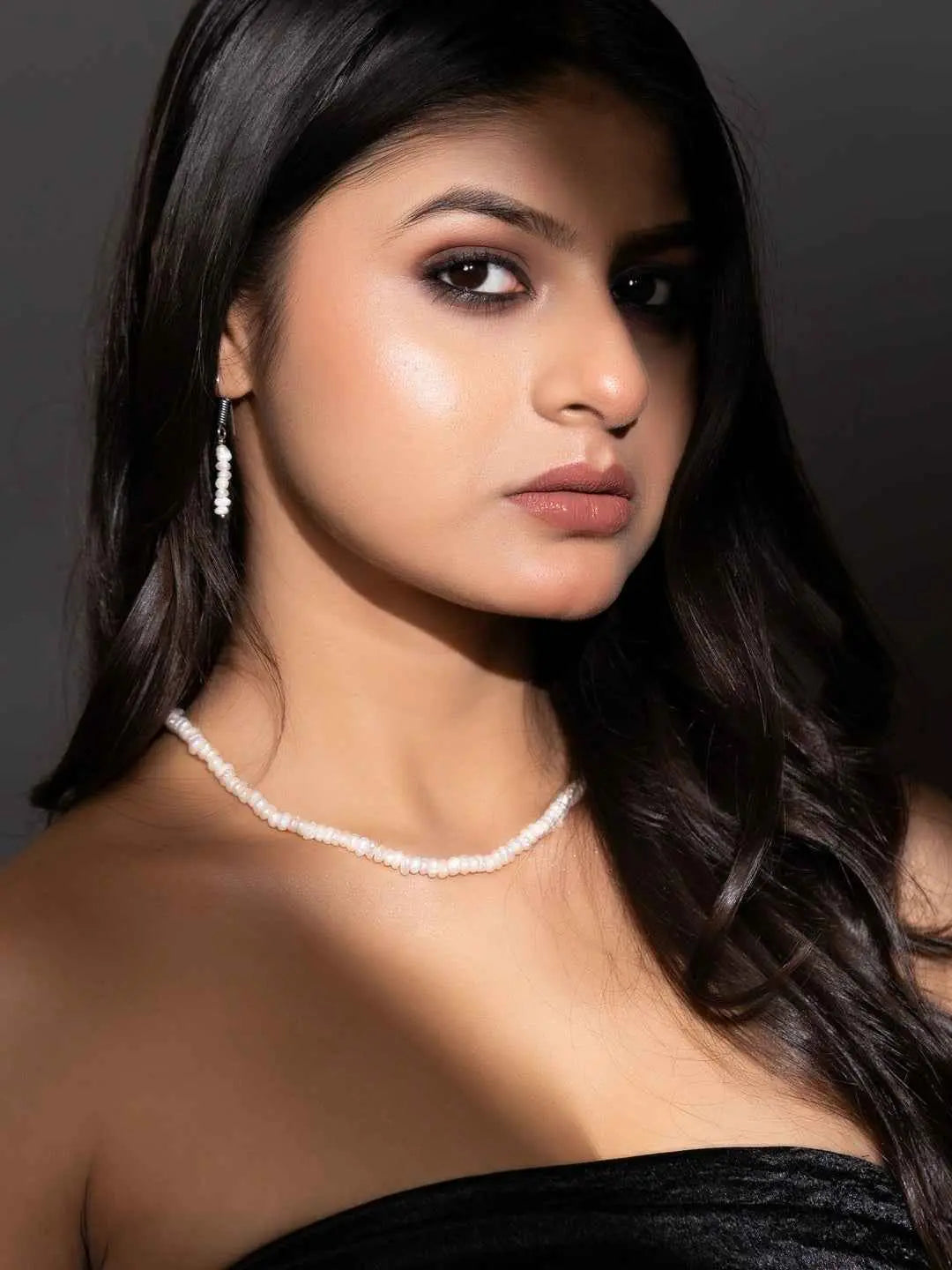 Elegant handmade pearl necklace set featuring lustrous white pearls with matching earrings