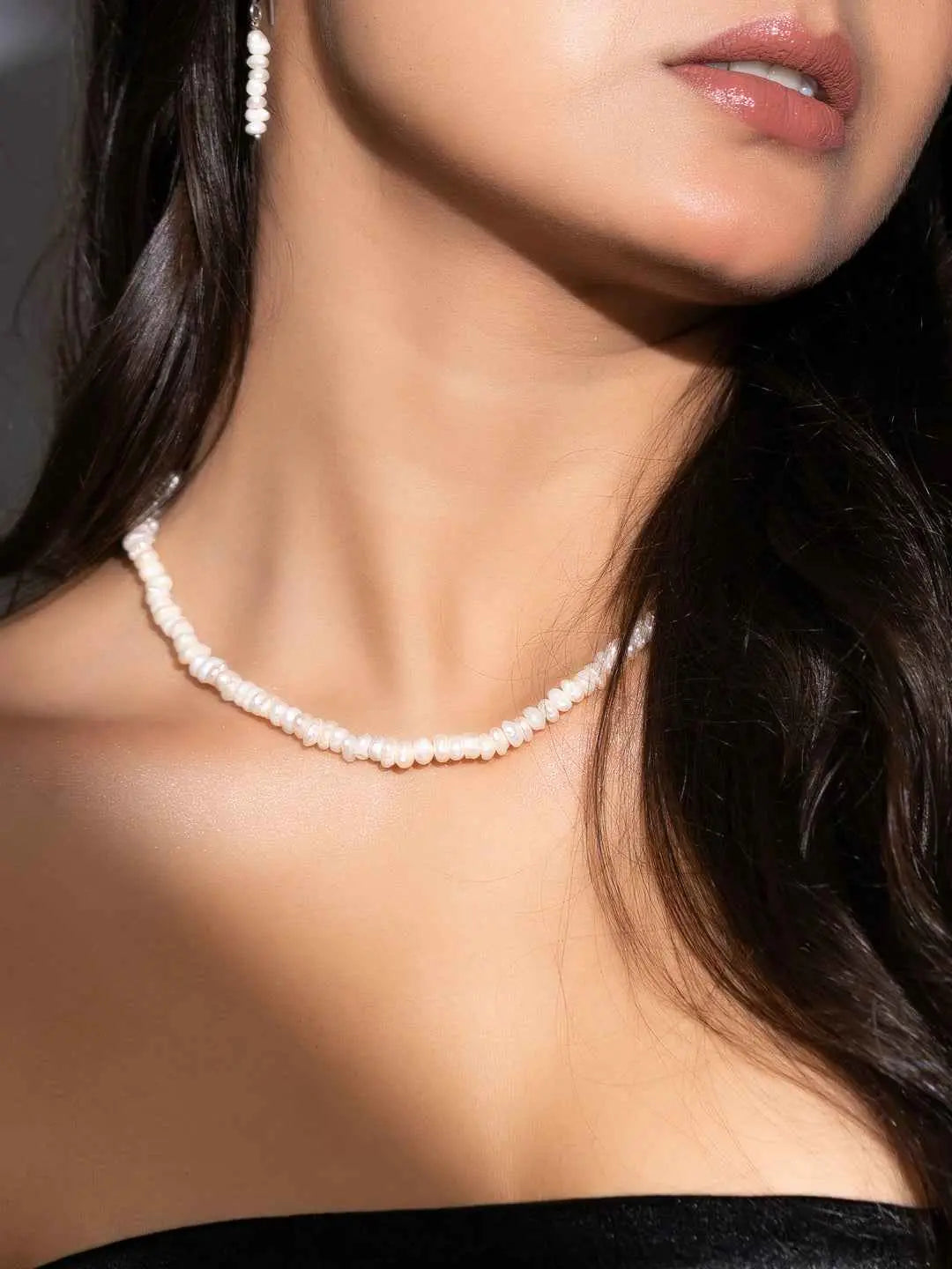 Handmade pearl necklace set in classic white with a natural, elegant design for timeless jewelry lovers