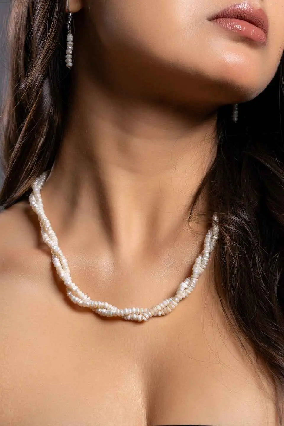 Handmade pearl necklace set with twisted strands of natural white pearls, perfect for elegant occasions