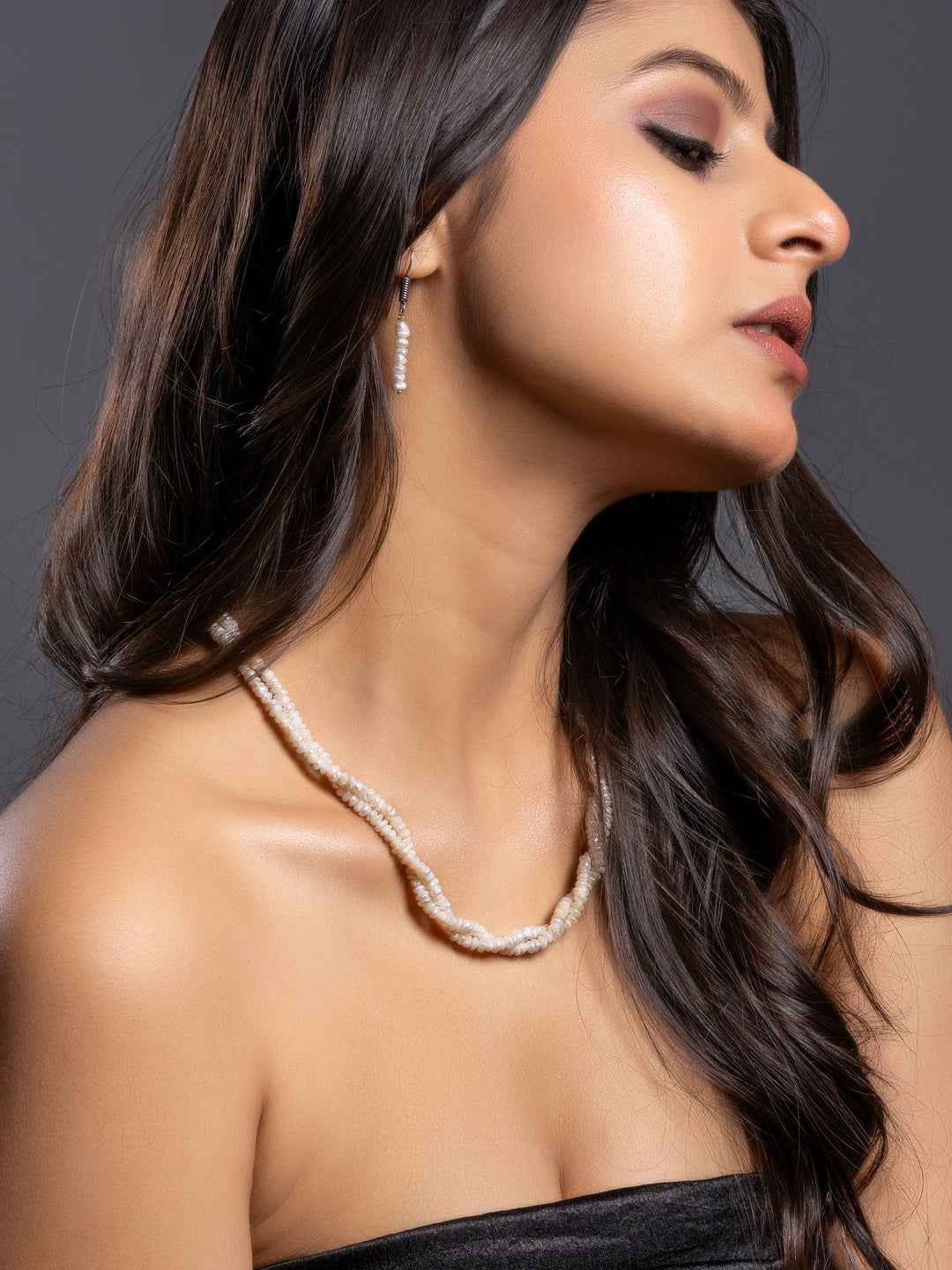 Elegant handmade pearl necklace set featuring lustrous white pearls and matching earrings