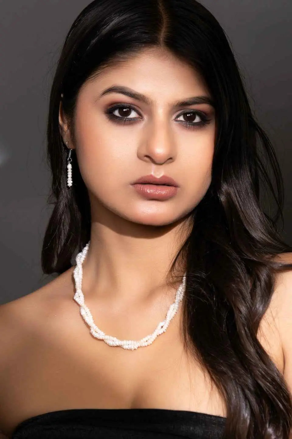 Handmade pearl necklace set in white with matching earrings, perfect for elegant occasions