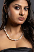 Elegant handmade pearl necklace set featuring natural white pearls and a classic design