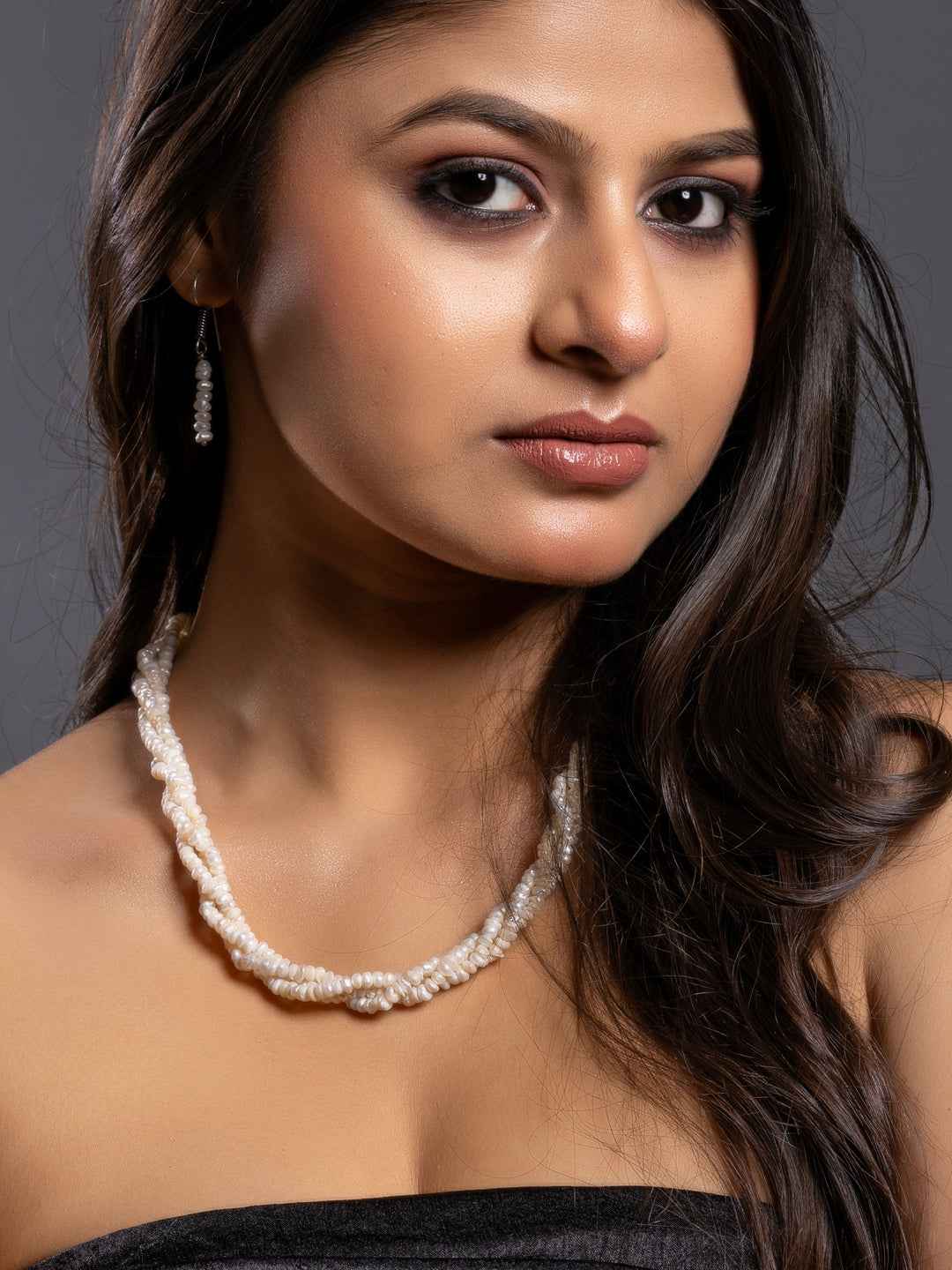 Handmade pearl necklace set with lustrous white pearls and matching earrings for elegant style