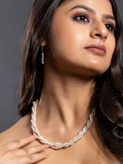 Beautiful handmade pearl necklace set in white, featuring layered design with matching earrings