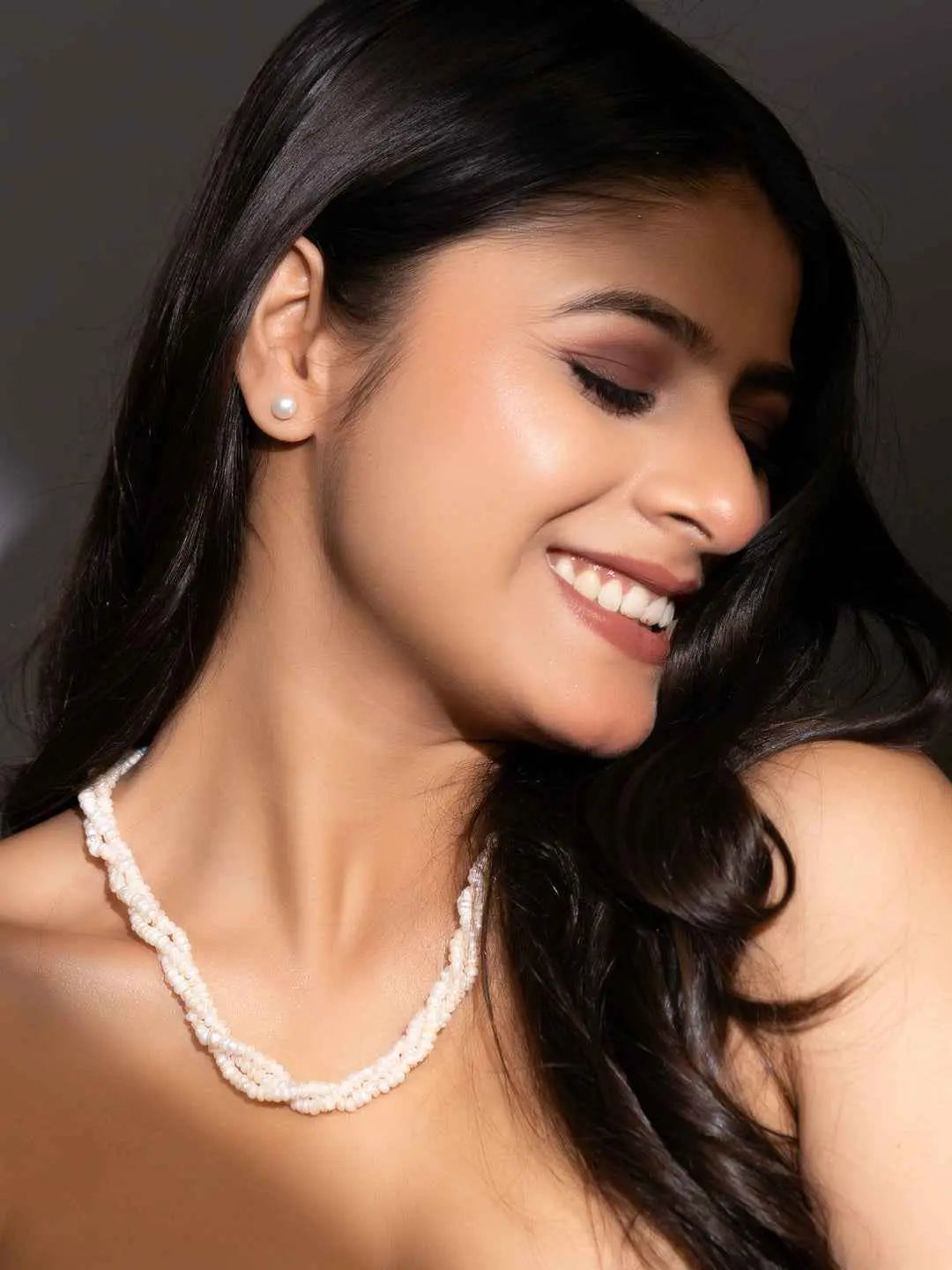Elegant handmade pearl necklace set featuring twisted strands in soft white color for sophisticated style