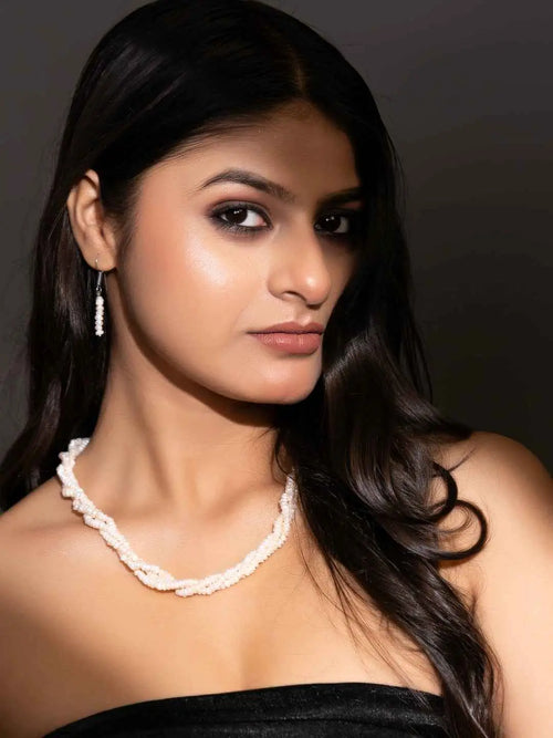 Handmade pearl necklace set featuring elegant white pearls, perfect for any formal occasion