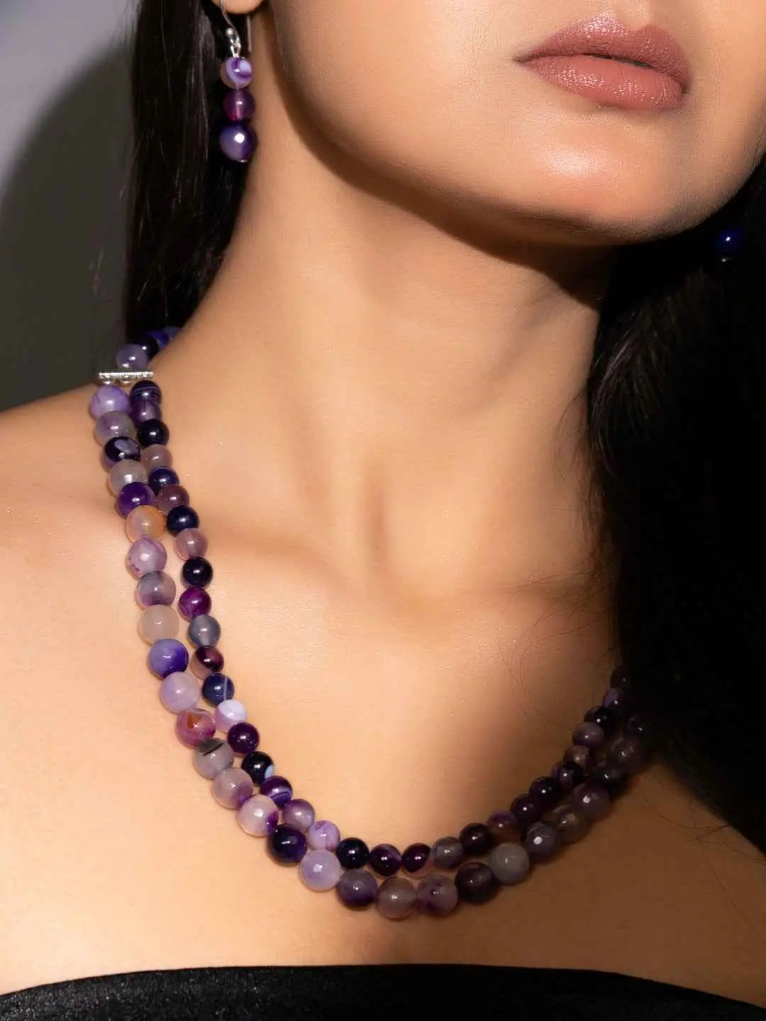 Handmade purple onyx necklace set with multiple strands showcasing elegant purple hues