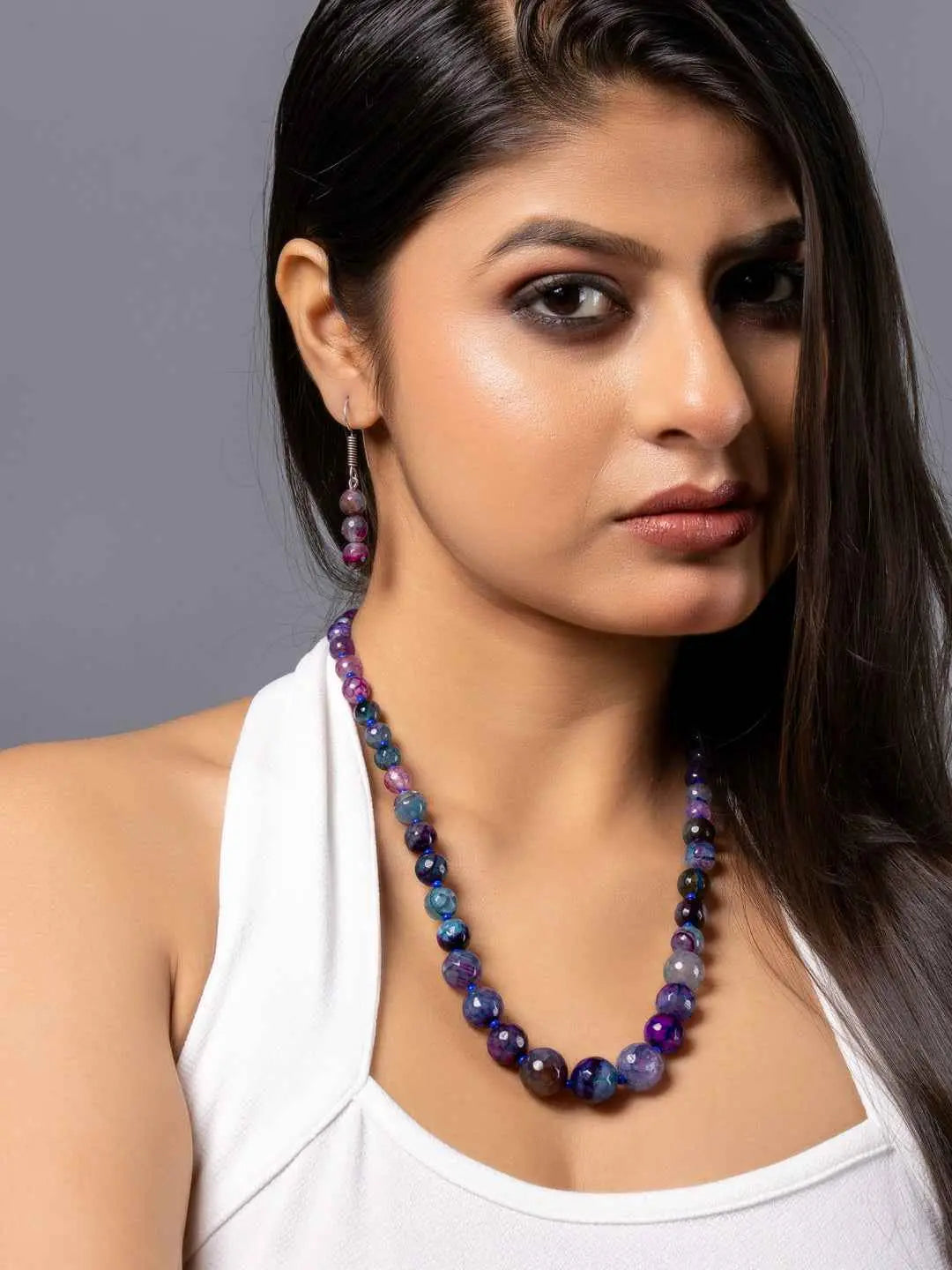 Purple onyx necklace set with multicolored beads and matching earrings, perfect for elegant occasions