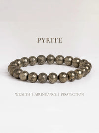 Raw pyrite bracelet designed by LOOK AND ADORN for wealth, abundance, and protection