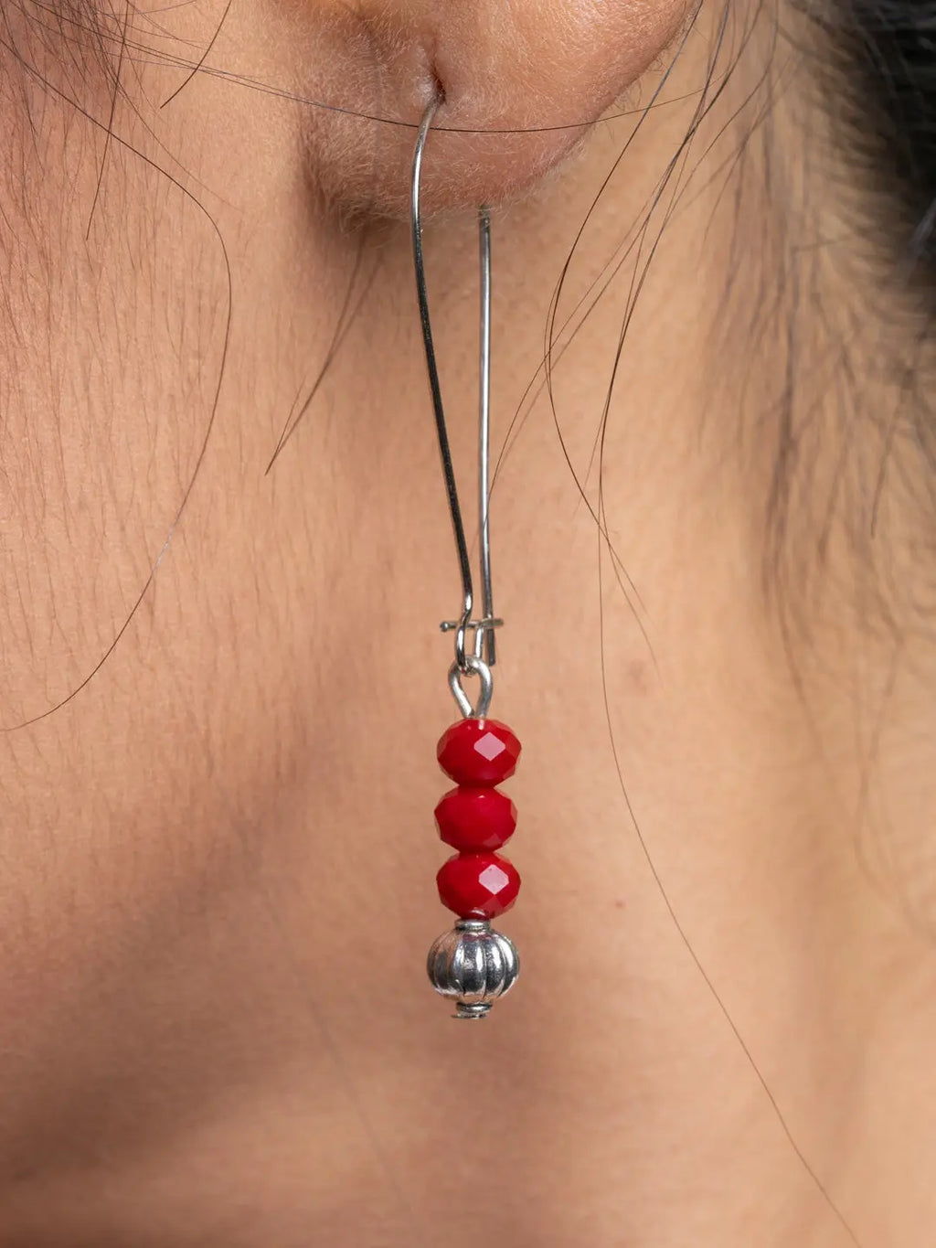 Handmade earring with three red crystals and silver bead from LOOK AND ADORN jewelry collection