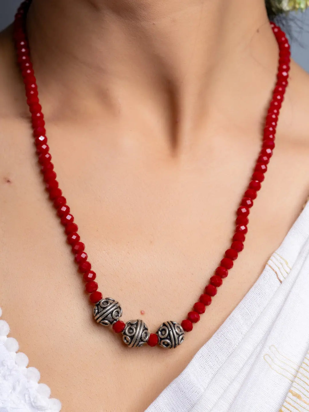 Handmade Red Crystal Necklace Set featuring vibrant red beads and three ornate silver accent beads