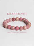 Rhodochrosite bracelet by LOOK AND ADORN featuring vibrant pink gemstones promoting love and positivity