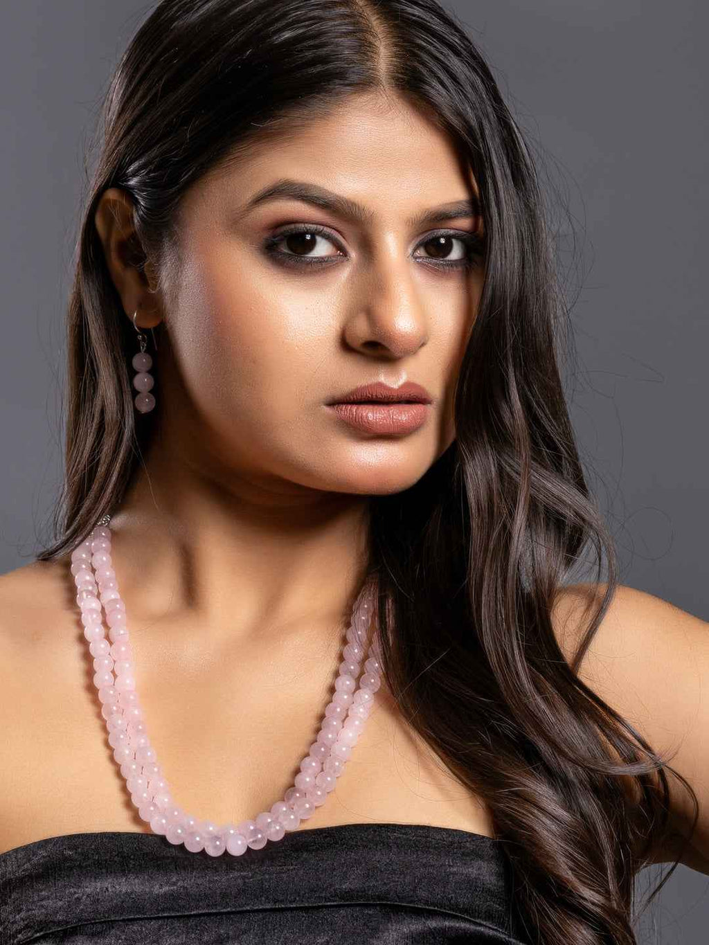 Handmade rose quartz necklace set in soft pink with matching earrings, elegant and stylish for any occasion
