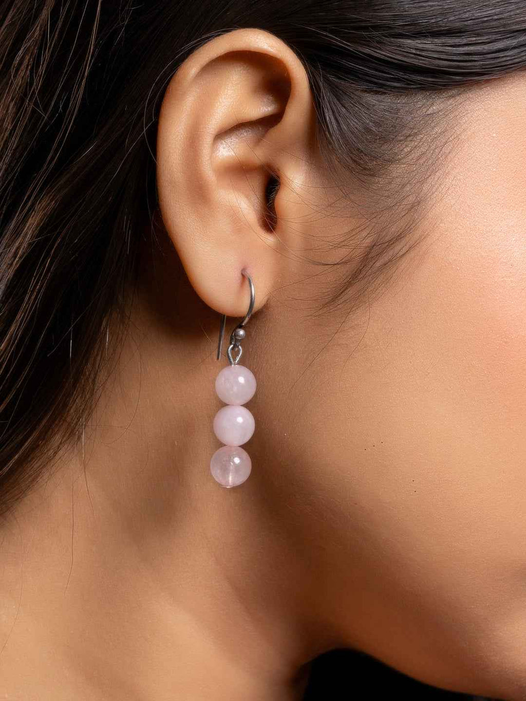 Handmade rose quartz necklace set in soft pink with elegant bead detailing for a delicate look