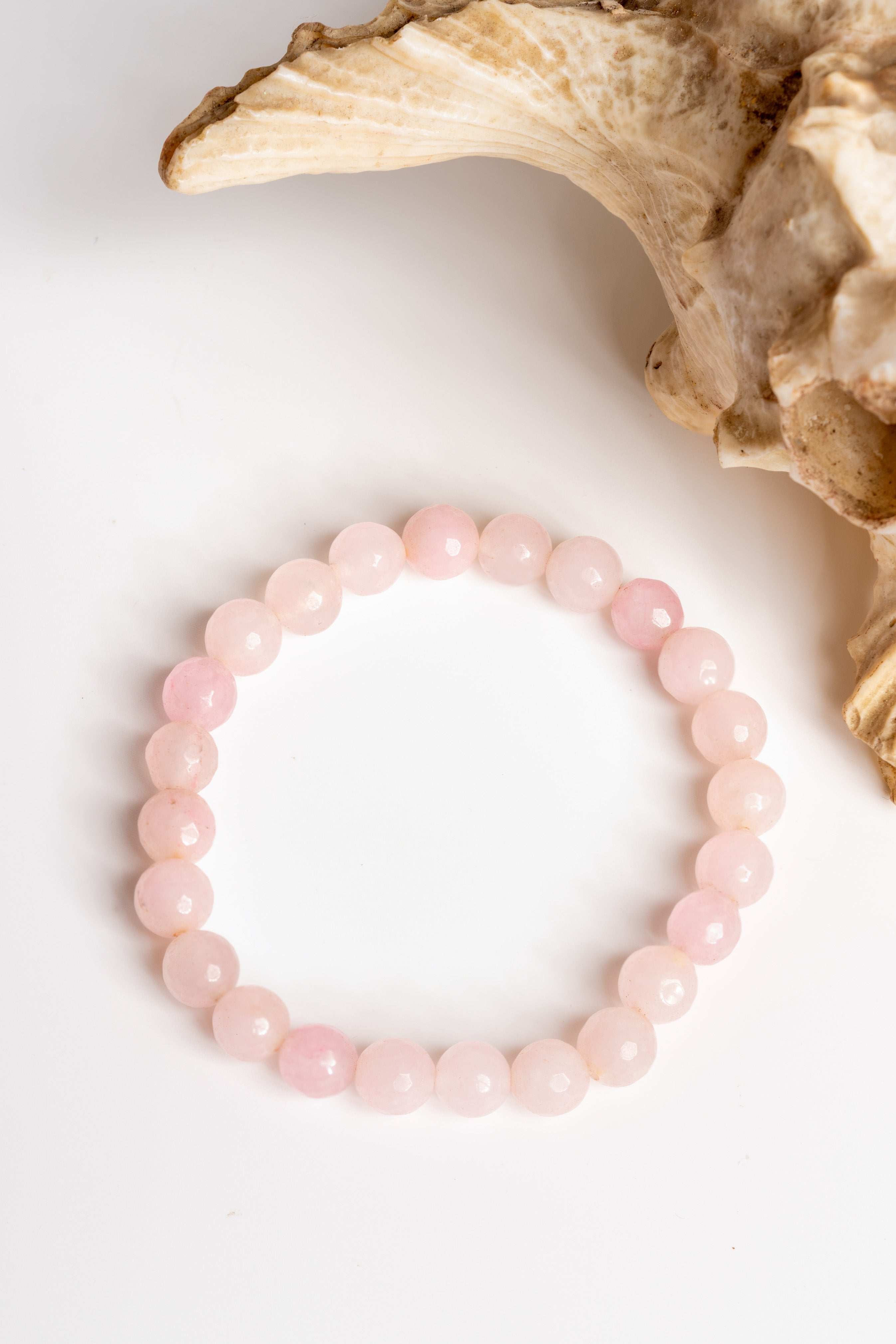 LOOK AND ADORN rose quartz stone bracelet with smooth pink beads for a delicate accessory