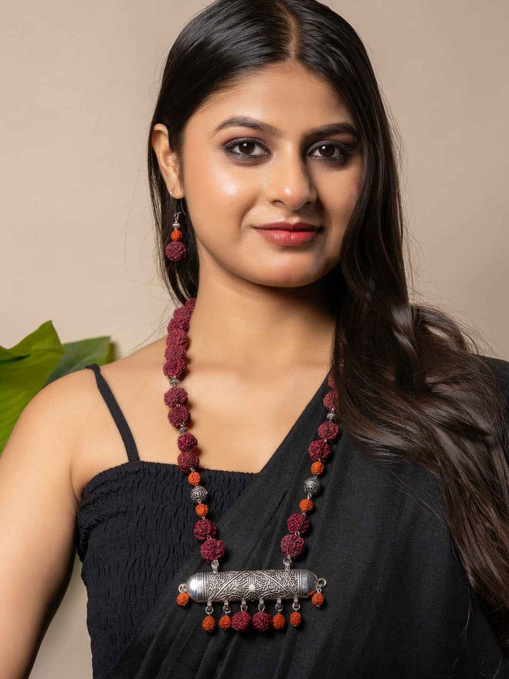 Handmade rudraksh necklace set in maroon with silver detailing and matching earrings