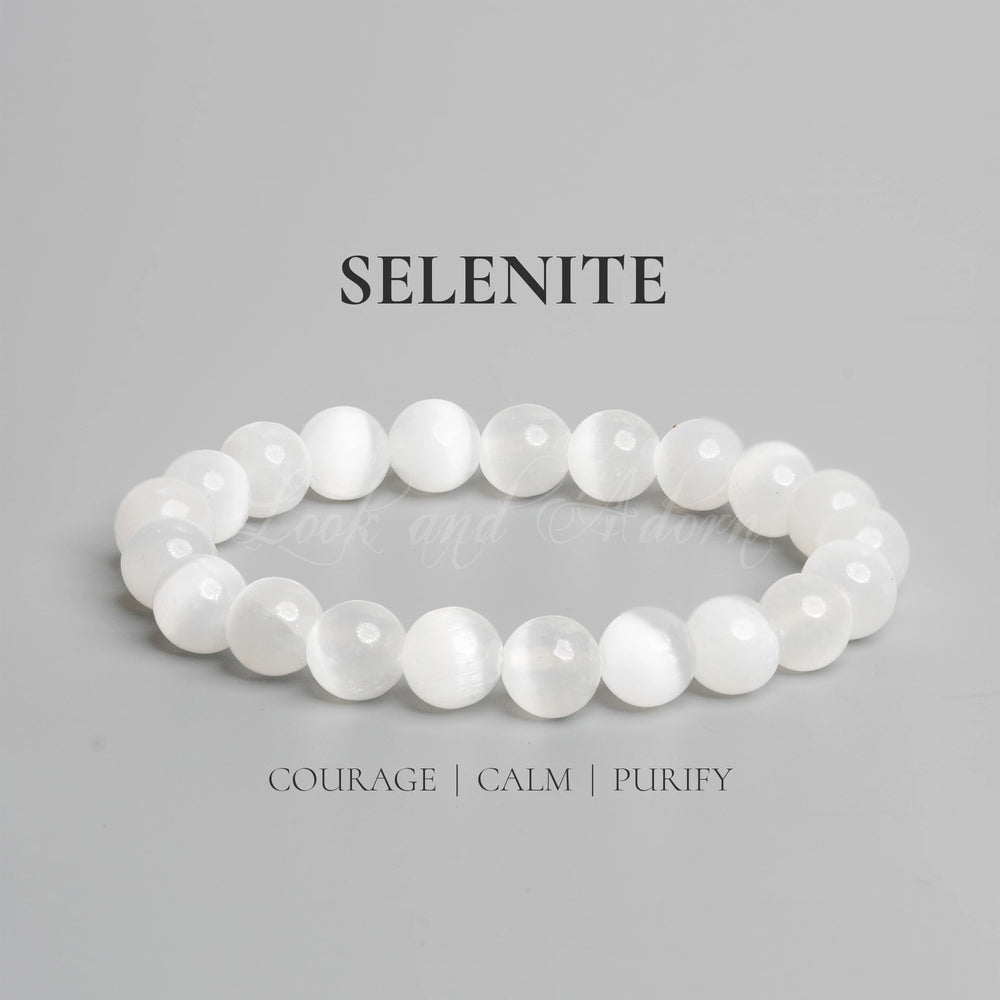 Selenite bracelet by LOOK AND ADORN featuring smooth white beads for courage and calm