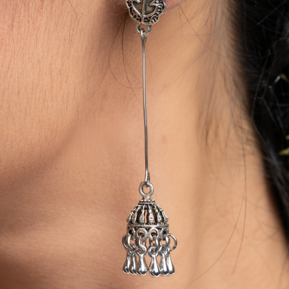 Oxidised silver lightweight jhumka earrings with intricate filigree design from LOOK AND ADORN