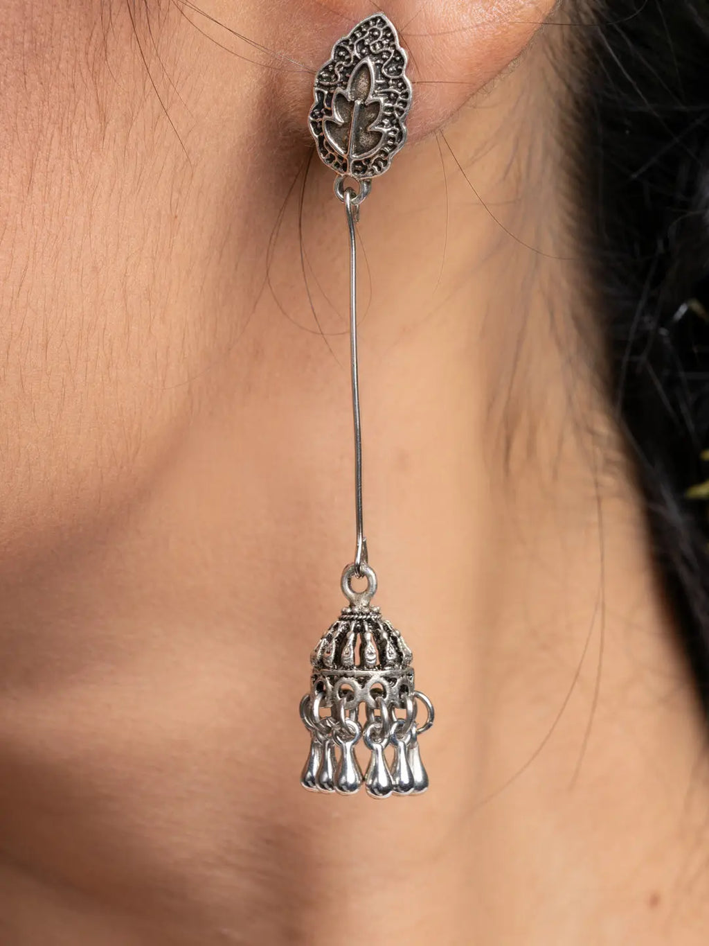 Oxidised silver lightweight jhumka earrings with intricate filigree design from LOOK AND ADORN