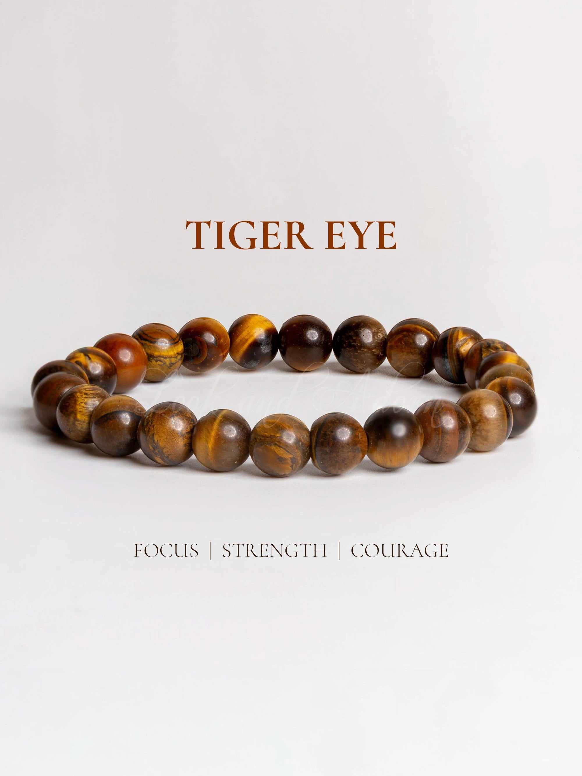 Tiger eye bracelet featuring smooth round beads for focus, strength, and courage