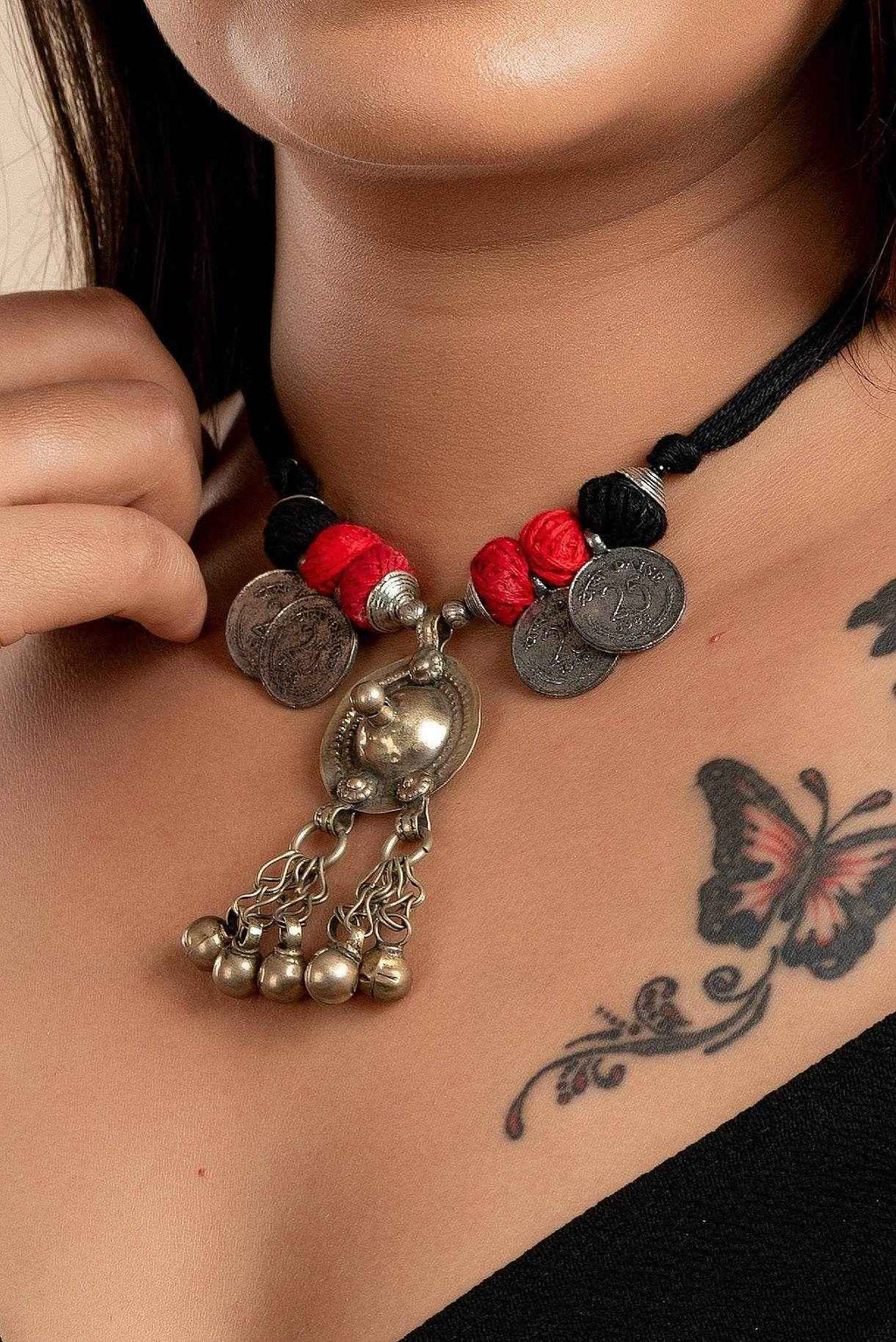 Afghani Necklace with antique silver coins and red and black thread detail from LOOK AND ADORN