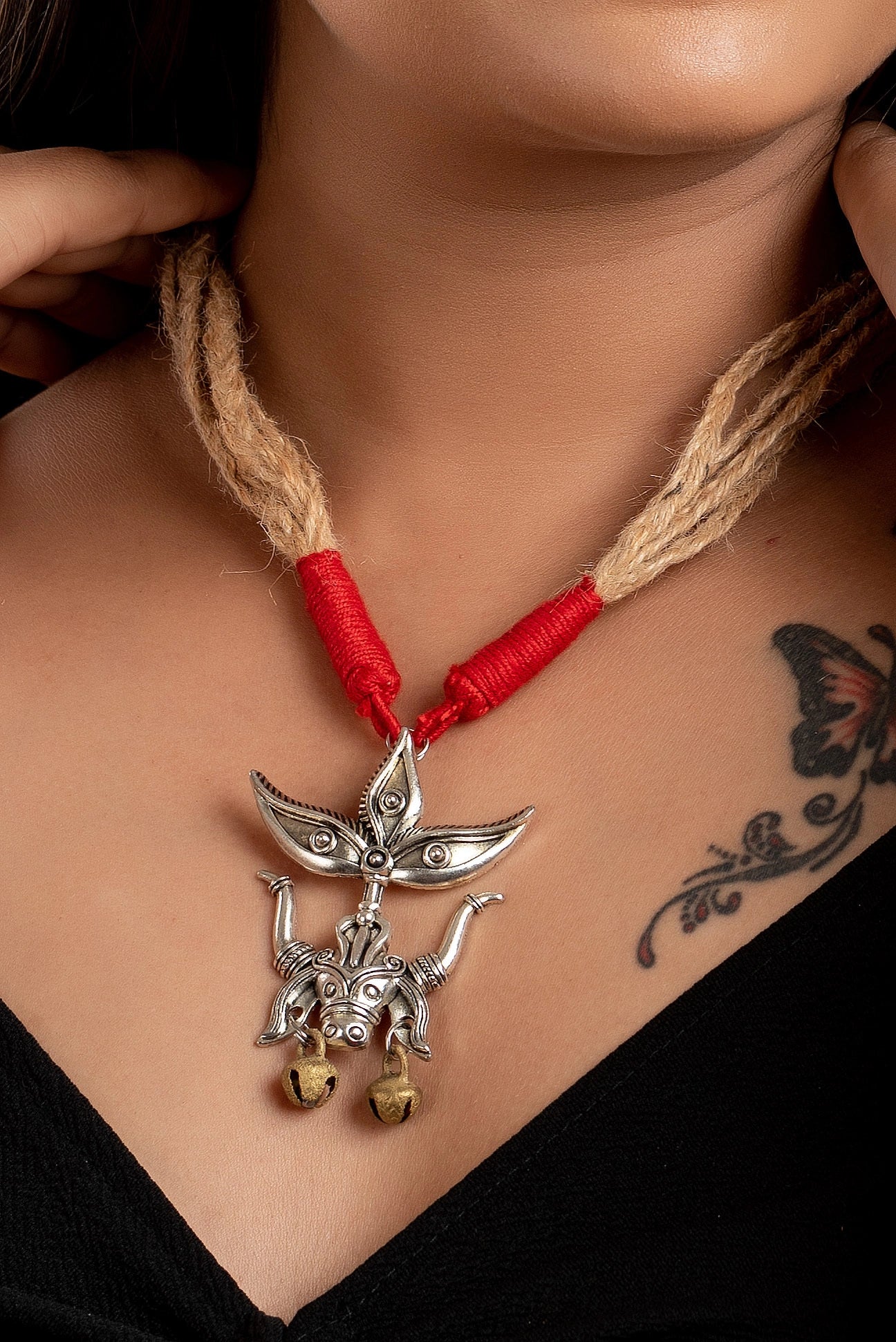 Designer Devi pendant with brass ghungroo and adjustable red beige jute dori